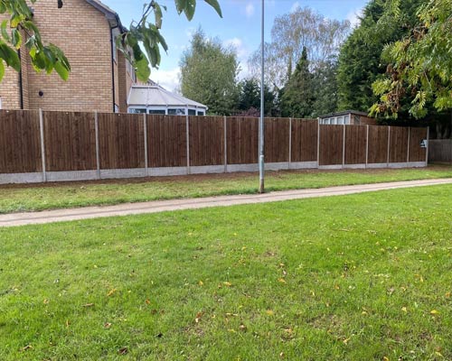 big garden fence job  - fencing services by DH & SONS Ltd